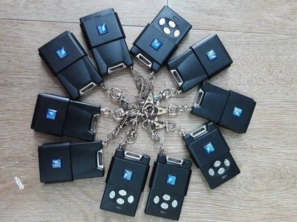 Tay điều khiển Remote cửa cuốn Austdoor