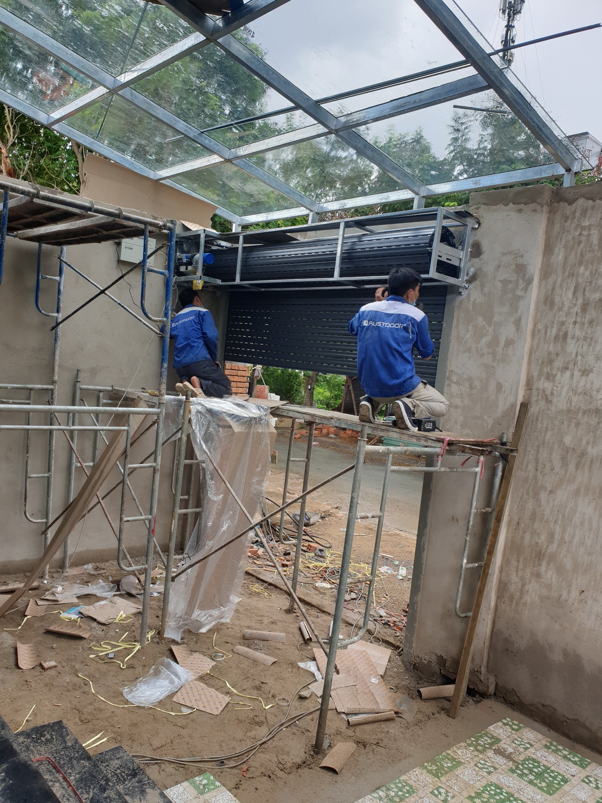 Sửa cửa cuôn Austdoor tại quận 5